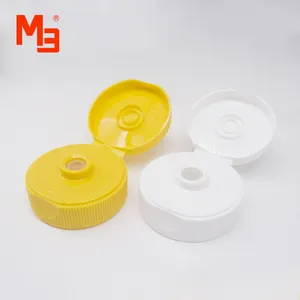 Campione gratuito M38/400 rotondo giallo plastica PP materiale spremere bottiglia Flip Cap bottiglia di miele Clamshell liscio a coste Flip Top Caps