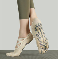 Chaussettes de yoga professionnelles à cinq orteils, chaussettes de Pilates antidérapantes à 4 sangles croisées, chaussettes à semelle en silicone antidérapante pour femmes