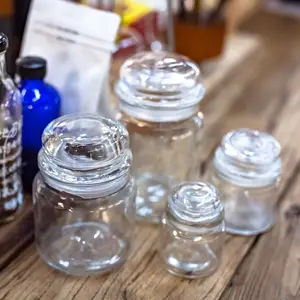 عرض ساخن على الزجاجات الشهيرة الشفافة الاسطوانية زجاجة تخزين الطعام حاوية المطبخ برطمان شمعة زجاجي مع غطاء