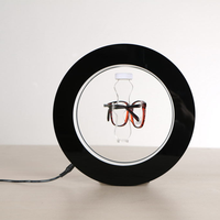 Vente en gros de présentoir créatif pour lunettes à lévitation magnétique, éclairage LED, présentoir rotatif pour lunettes de soleil
