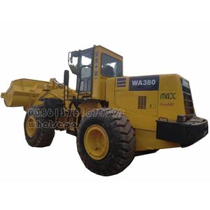 Komatsu Mini-chargeur d'occasion d'une capacité de 5 tonnes avec moteur central, pompe à roulement, composants de boîte de vitesses - Product Image 1