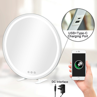 Miroir de maquillage rond blanc avec anneau lumineux à lumière chaude et base à pieds discrets, miroir de vanité LED de table