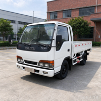Camion plateau diesel Isuzu NHR 4X2 d'occasion, options conduite à gauche/droite, boîte de vitesses manuelle pour le transport de marchandises et de matériaux de construction