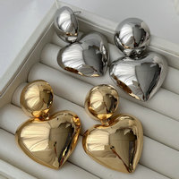 2025 accessoire d'oreille chunky le plus populaire finition miroir or et argent liaison ronde avec boucles d'oreilles en forme de coeur