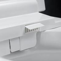 WC intelligent monobloc moderne en céramique avec chasse d'eau automatique à capteur au sol, siège chauffant et télécommande