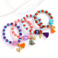 Bracelet Bohème Multicouche pour Femme avec Breloque Pompon Œil Porte-Bonheur et Perles de Cristal, Plaqué Or, Style Océan, Bijou de Plage