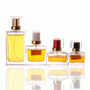 Botol parfum kaca persegi panjang bening kualitas tinggi klasik 25ml 35ml 50ml 100ml dengan tutup berwarna persegi akrilik