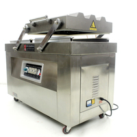 Machine d'emballage sous vide, avec modification d'ambiance