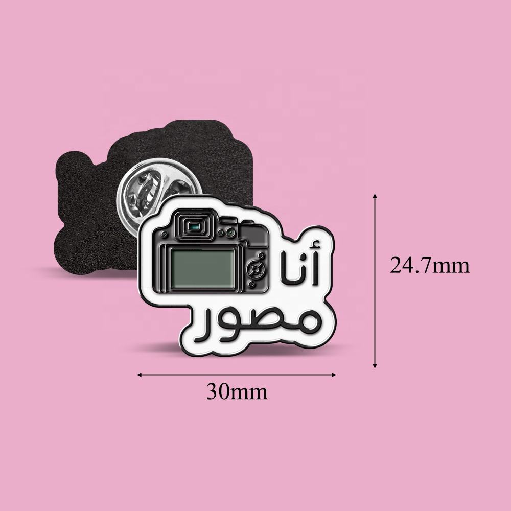 Broche de photographe