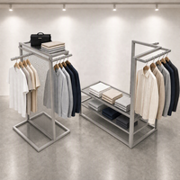 Présentoir de vêtements en treillis métallique noir avec double tringle de suspension et étagères en maille, modèle îlot, vente en gros