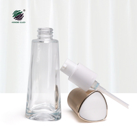 Nouveau design de bouteilles cosmétiques en verre transparent vides de 30ml avec distributeur de pompe à lotion à bec en plastique de 20mm pour la crème