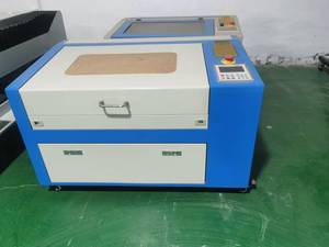 3050 4060 60w मिनी 3 डी को2 कटिंग मशीन रूइदा एम 2 वाटर पंप के साथ लकड़ी के लिए 50w ग्लास ट्यूब लेजर उत्कीर्णन मशीन लंबे जीवन - Product Image 6