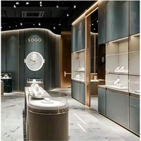 Comptoirs en marbre de style bois moderne pour bijouterie, conception personnalisée complète, armoires murales encastrées, présentoirs en îlot de marbre avec zone VIP