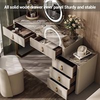 Bureau de toilette moderne de luxe avec plateau en pierre, 360 °   Miroir LED rotatif et armoire latérale rétractable pour chambre à coucher.