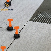 Système de nivellement de carreaux réutilisable DECORTRIM pour la pose de carreaux muraux et de sol - Vente en gros directe usine