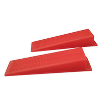 Les clips du système de nivellement des carreaux de 1/8 po comprennent des entretoises de nivellement des carreaux
