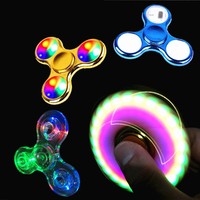 Vente en gros : Gyro de doigt en plastique électroplaqué, modèle 0007, avec effet cristallin, emballage transparent