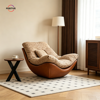 Fauteuil lounge Cloud de luxe, fauteuil d'appoint rembourré en tissu avec base en cuir ciré, mobilier moderne pour salon
