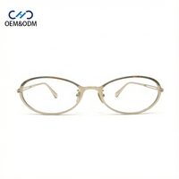 M10313 Monture de lunettes pour femme œil de chat, monture intégrale en métal, branches ajourées à double maillon unique, monture optique ovale vintage