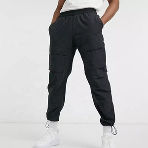 OEM toptan spor giyim Polyester naylon siyah Jogger taktik rüzgarlık eşofman altları özel Logo teknoloji dokuma erkek kargo pantolon - Product Image 1