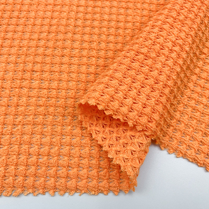 Tissu jacquard texturé en polyester, élasthanne et viscose, respirant, poids moyen, extensible dans les 4 sens, tissu seersucker pour robes de filles et de garçons - Product Image 1