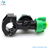 Buse de pulvérisation à clipser en plastique, avec bouchon à vis vert, embout jaune et corps noir, pour lignes de refroidissement et de lavage