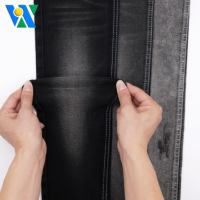 Tela vaquera elástica TR de 10,5 oz, dos lados, negra, media alta elasticidad, RHT, tela vaquera tejida de sarga, fabricante de rollos de tela vaquera