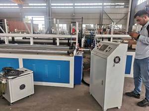 Máquina de rebobinado de papel higiénico completamente automática Máquina de fabricación de papel higiénico Jumbo Máquina cortadora de rollos de tejido - Product Image 6