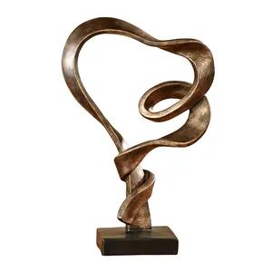 愛の像のようなアンティークゴールドハートデザイン彫刻樹脂リボン