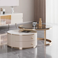 Table basse relevable moderne en pierre frittée avec rangement dissimulé, beige crème, structure métallique minimaliste, mobilier de salon