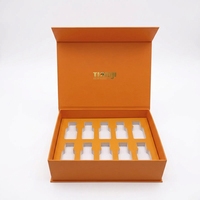 Boîte en carton magnétique à couvercle rabattable personnalisée, carton recyclable, impression CMYK, logo en relief, insert en EVA pour flacons d'huiles essentielles et de sérums
