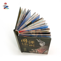 Livre relié rigide bien conçu, impression couleur pleine page, bords pulvérisés à la feuille métallisée, édition spéciale, impression sur carton de collection