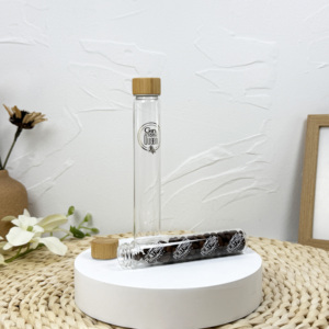 Botella de Vidrio Redonda Tipo Tubo con Tapa Blanca y Negra a Prueba de Niños - Product Image 5