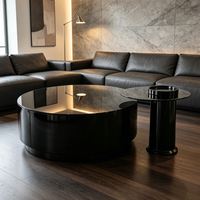 Ensemble de tables basses gigognes de luxe style ferme, en verre trempé noir brillant et métal, avec piédestal cylindrique robuste, table d'appoint décorative pour la maison