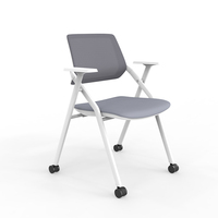 Chaise de bureau pliable et empilable à roulettes, idéale pour salles de classe, salles de conférence et formations, avec tablette d'écriture intégrée