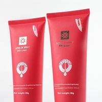 Flacon cosmétique vide en plastique souple rouge de 80g pour crème pour les yeux avec tête de pompe à vide à pression de 40 mm de diamètre