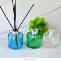 Bouteille diffuseur de parfum en verre transparent rond de luxe 100 ml avec bouchon à vis et marquage à chaud pour la vente en gros