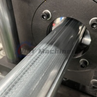 Machine de formage de rouleaux pour lames de porte à enroulement de haute qualité, fabrication chinoise Boshiyi, commande PLC, moteur hydraulique, pompe à engrenages pour toiture