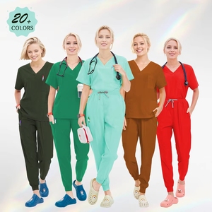 Tenues médicales unisexes personnalisées avec logo tissé en polyester et élasthanne – Ensembles infirmiers, médecins, dentistes, hôpitaux – Blouse et pantalon de jogging - Product Image 1