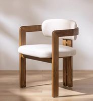 Chaise de salle à manger en bois massif de designer italien, chaise rembourrée moderne de luxe léger pour la maison, la salle de thé ou les négociations
