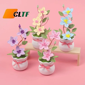 Nouvelle fleur artificielle tricotée à la main 2026, plante de clématite en pot, fleur en crochet pour décoration maison et voiture, cadeau de Saint-Valentin - Product Image 1