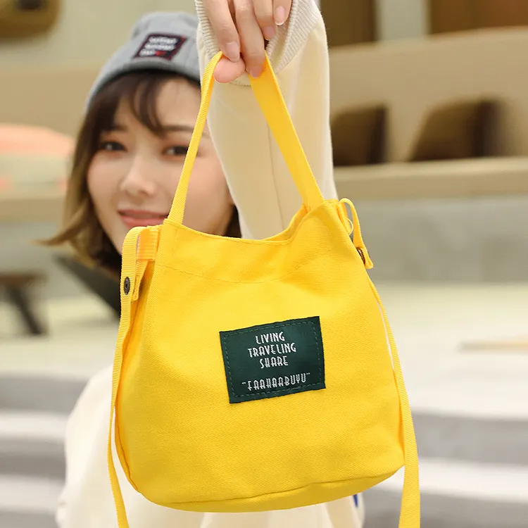 Mini Tote Bag in tela personalizzata più venduta Totes a tracolla Color caramella con cinturino lungo per ragazza e bambino