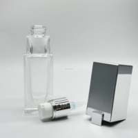 Pompe de traitement d'échelle en argent de haute qualité avec bouchon en argent pour bouteille en verre transparent transparent de 30ml 18mm