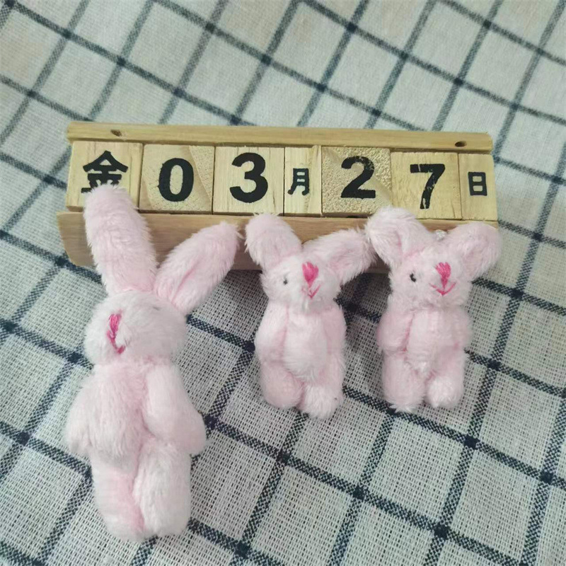 Lapin rose à poils longs 45cm