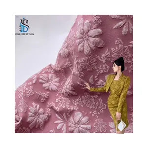 Top quality polyester gerbera pattern three-dimensional embossed jacquard fabric for clothing