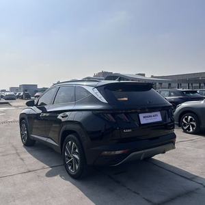 <span class=keywords><strong>Tucson</strong></span> <span class=keywords><strong>Hybride</strong></span> SUV <span class=keywords><strong>2023</strong></span> d'occasion Boîte automatique Volant à gauche Galerie de toit en alliage d'aluminium Tissu R17 Foncé 4L En promotion - Product Image 2