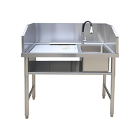 Table de préparation et de travail en acier inoxydable épaissi pour la manipulation du poisson, la découpe, l'abattage et le lavage en cuisine, avec évier intégré