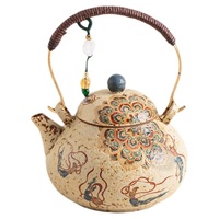 Théière Dunhuang Flying Apsaras à poignée en forme de poire, en céramique bleu et blanc avec glaçure rouge silex, résistante à la chaleur, design rétro