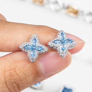 Boucles <span class=keywords><strong>d</strong></span>'oreilles pour femmes en argent S925 en forme de fleur, saphir bleu aquamarine, zircone cubique AAAAA, plaqué or 14 carats, trèfle à quatre feuilles - Product Image 1