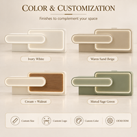 Comptoir d'accueil moderne pour salon de beauté, beige crème, asymétrique, double couche, façade arrondie avec éclairage LED chaud pour hall de spa
